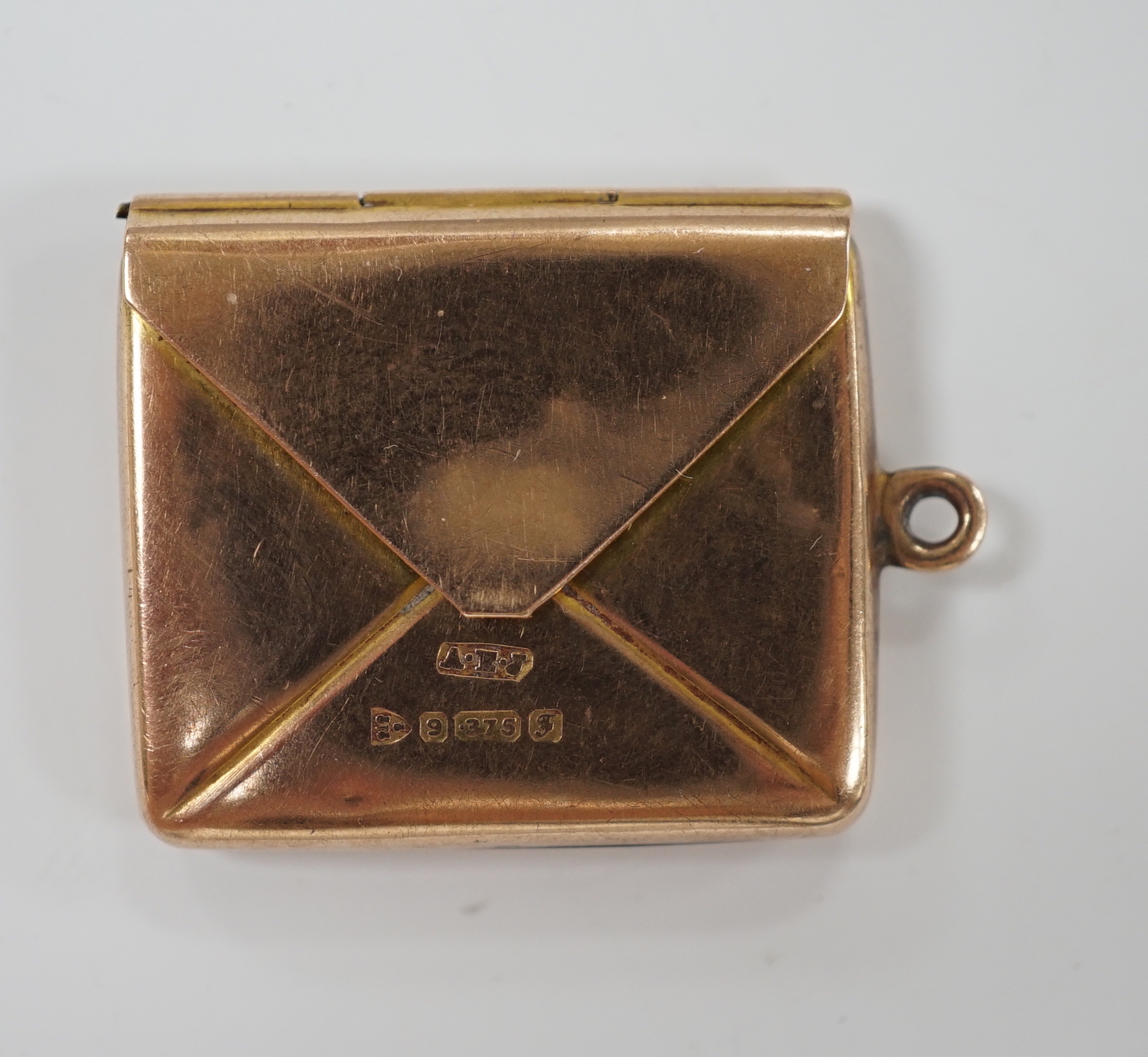 An Edwardian 9ct gold 'envelope' stamp case, Albert Ernest Jenkins, Chester, 1906, 26mm, 4.1 grams, with engraved monogram.